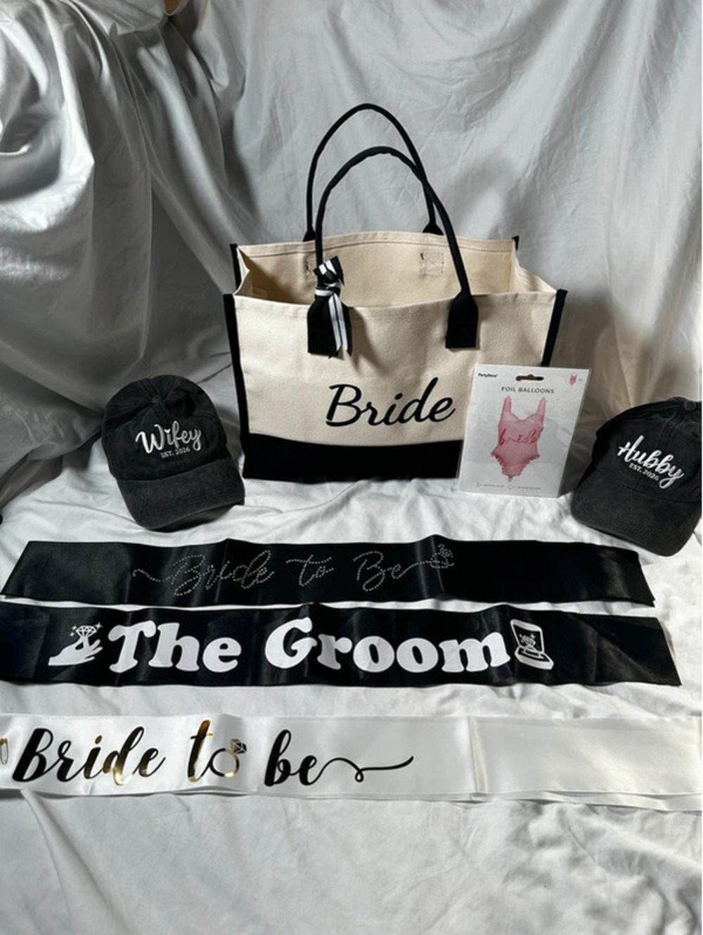 Bride bag with other wedding merch